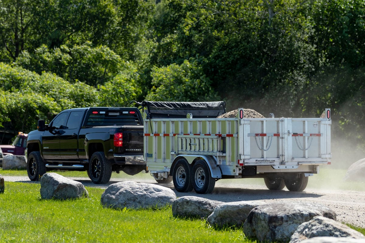 Black Truck Pulling Mission Commercial Utility Dump Trailer